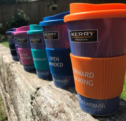 Travel mugs which carry company value colours
