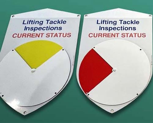 Lockable status dial shields